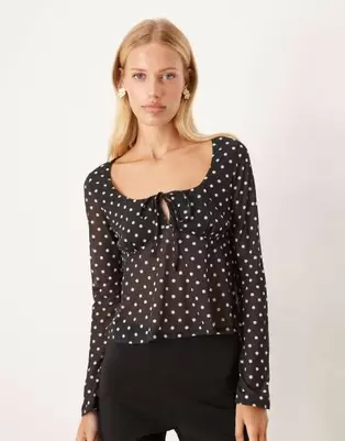 ASOS DESIGN mesh floaty flare sleeve top in black polka dot