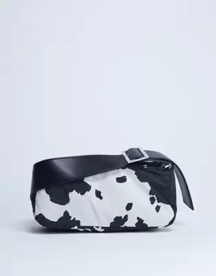 Topshop Kylie nylon cross body bag with contrast strap in cow print