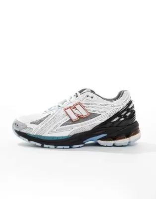 New Balance 1906 sneakers in white with blue and orange details