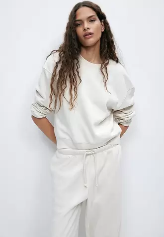 Loose-fit sweatshirt - light beige