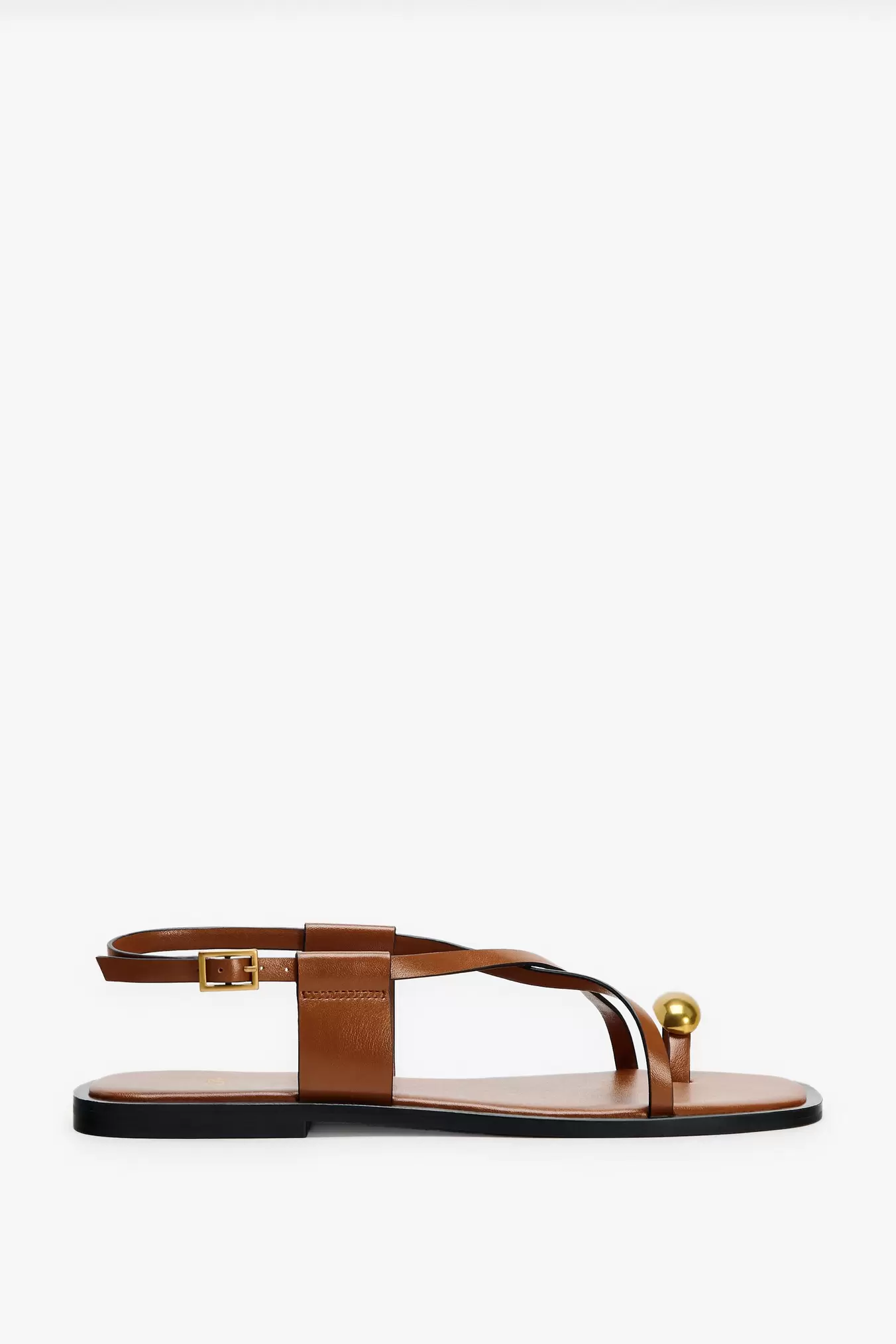FLAT STRAPPY SANDALS WITH METAL ADORNMENT