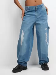 The FIX Women's Light Wash Barrel Rip & Repair Jeans