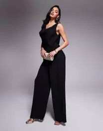 ASOS DESIGN cowl neck wide leg jumpsuit with gold hardware in black