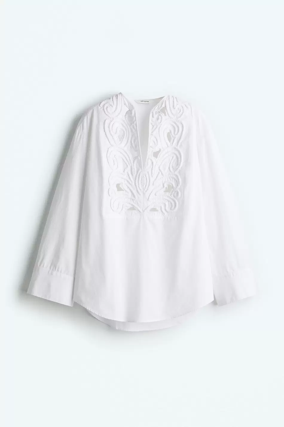 Blusa con broderie inglés