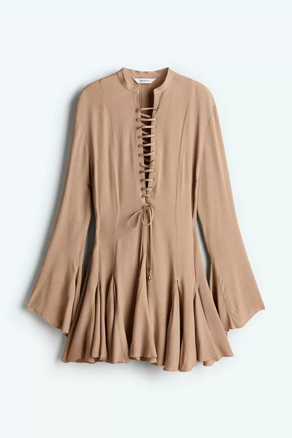 Vestido acampanado con lazada