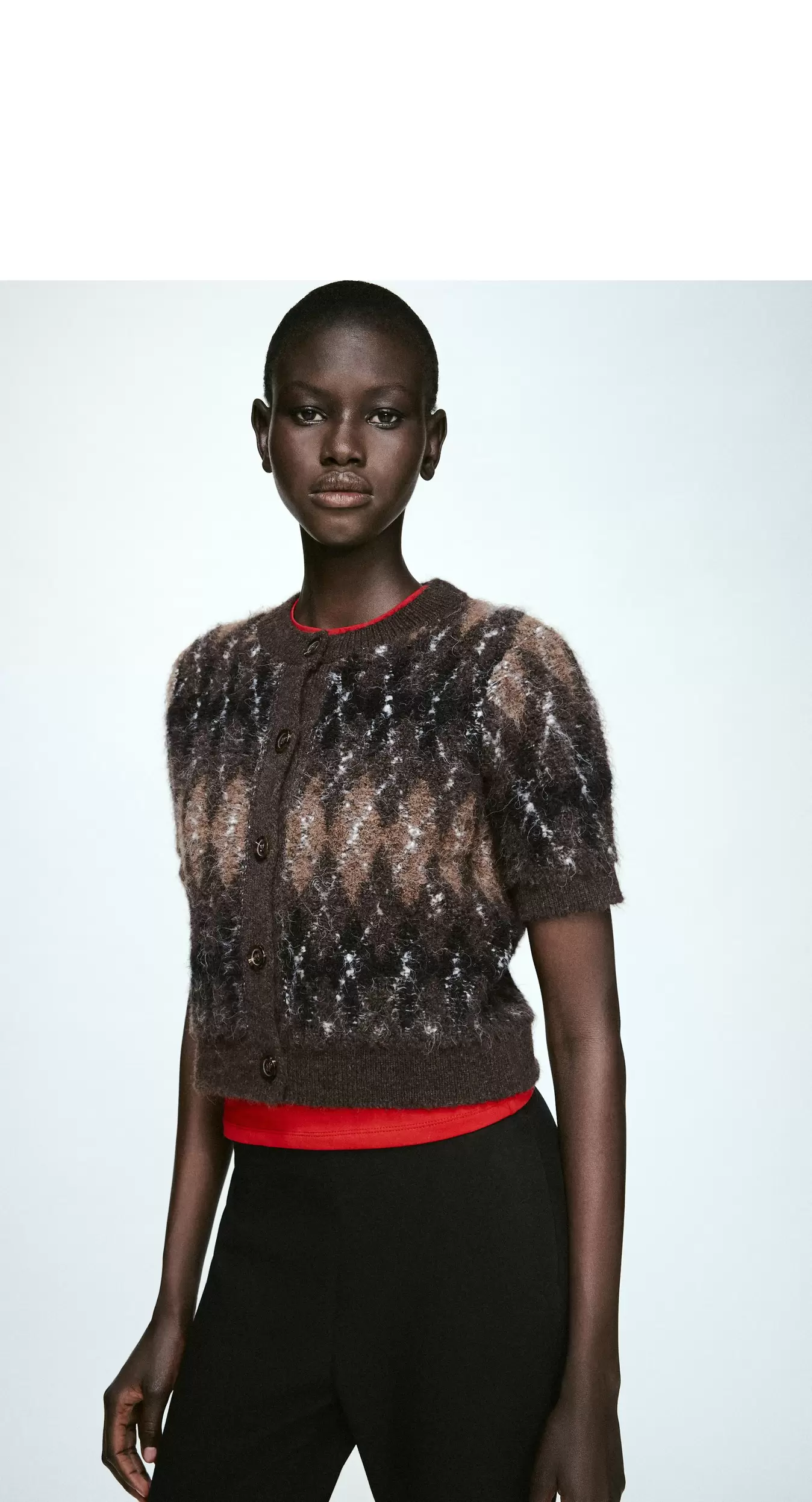 CHAQUETA PUNTO ROMBOS MANGA CORTA