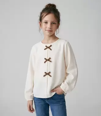 Polera niña con lazos