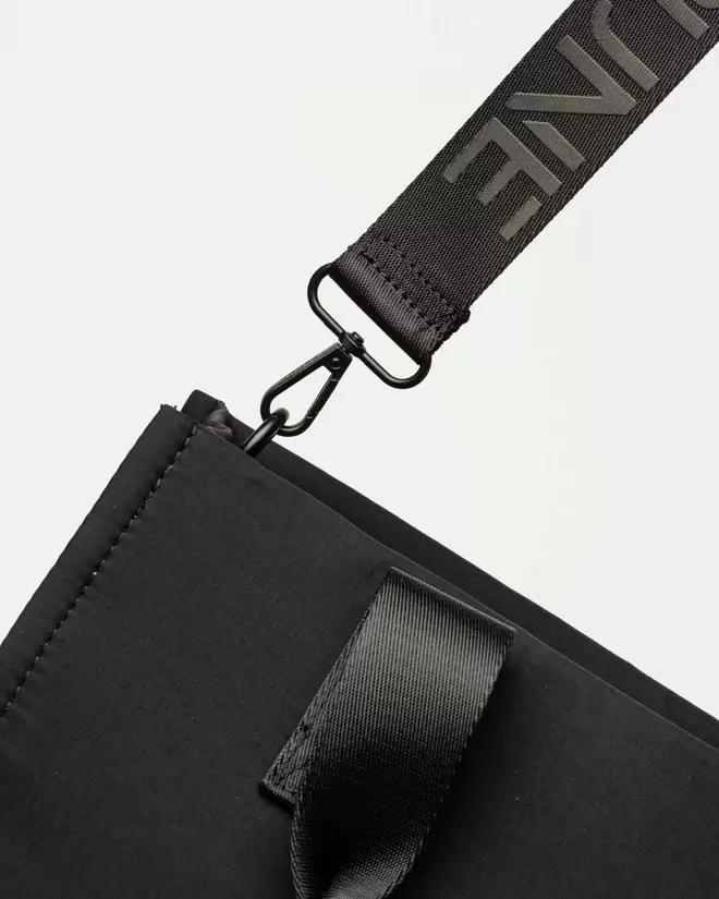 Cartera de mano Flight en nylon washed