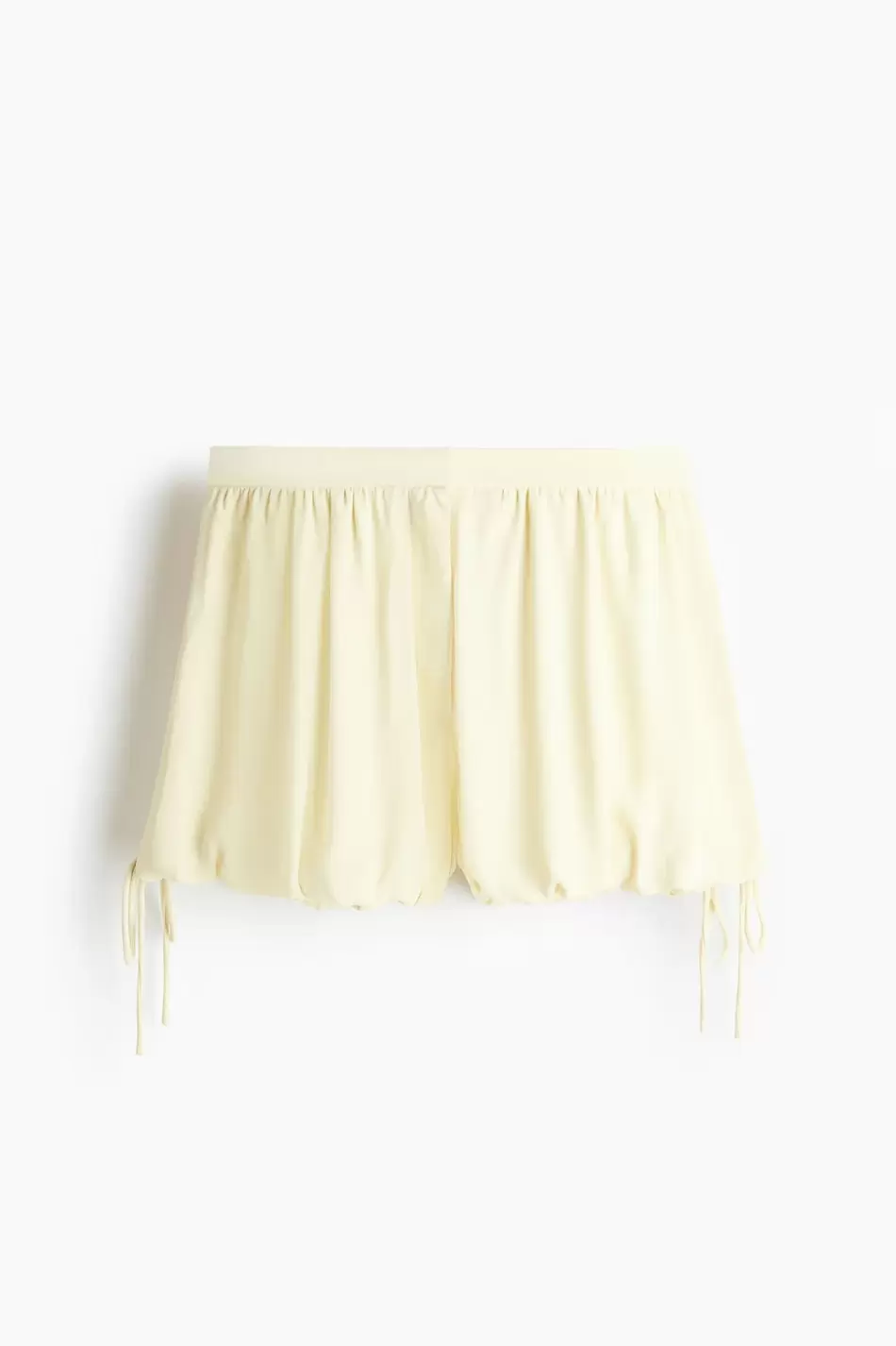 Shorts globo con cordón de ajuste