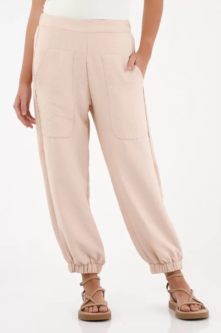 Pantalón jogger tela tipo satén rosada para mujer