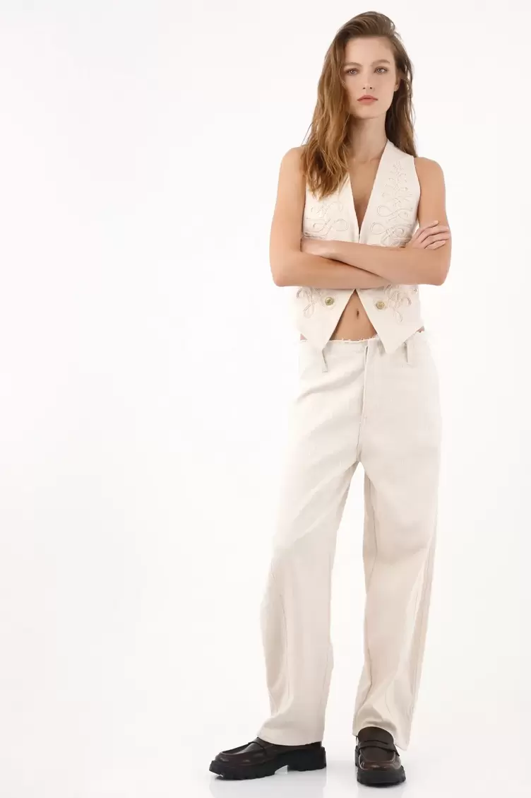 Pantalón wide leg con textura en relieve en algodón marfil para mujer