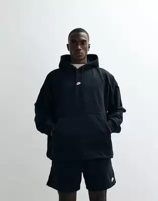 Nike Club French Terry oversized hoodie in black