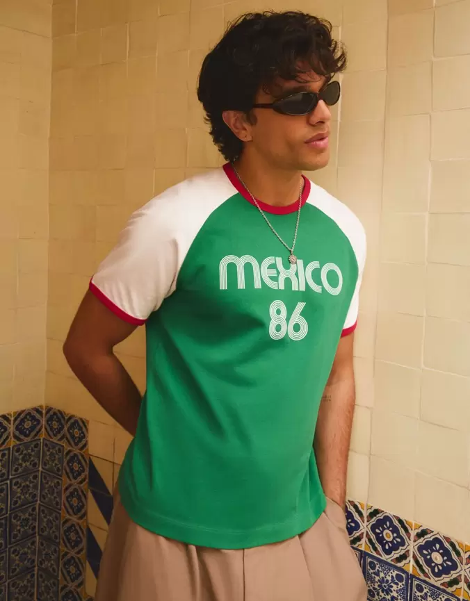 Camiseta slim fit raglan print
