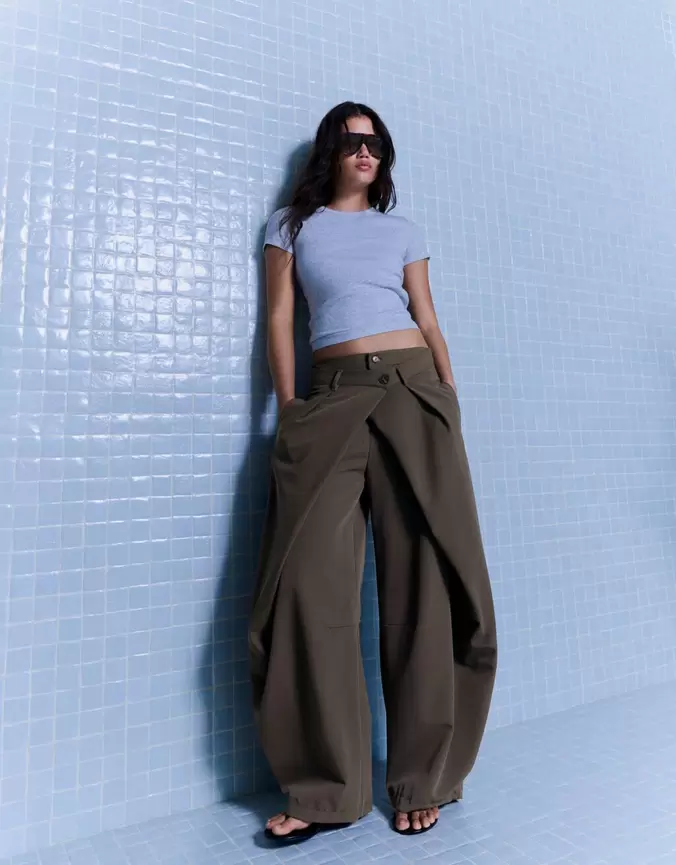 Pantalón pliegues doble botón