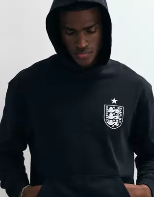 ASOS DESIGN relaxed hoodie with FA England three lions print in Black