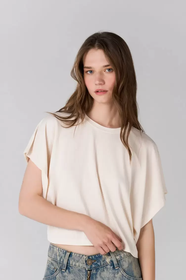 Camiseta boxy con mangas caídas en marfil para mujer
