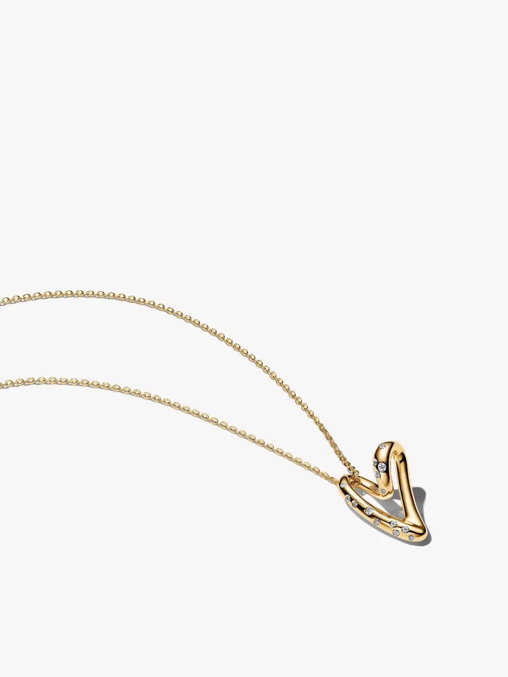Collar con colgante corazón de forma orgánica engastado con piedras