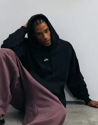 Nike Club French Terry oversized hoodie in black