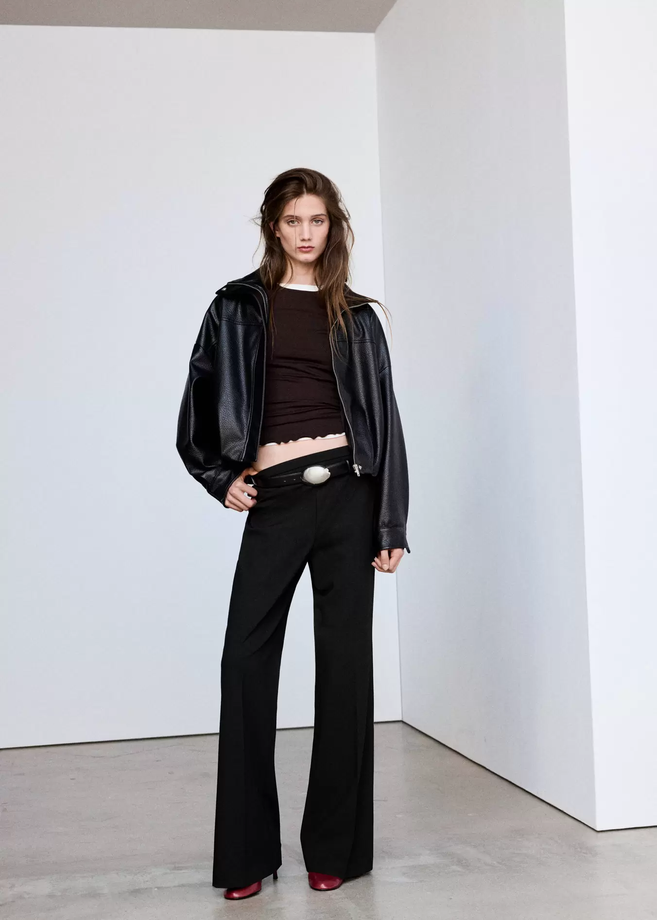 Flared trousers with pressed crease