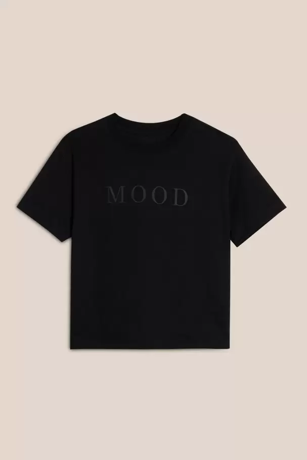 Camiseta estampada unicolor holgada manga corta