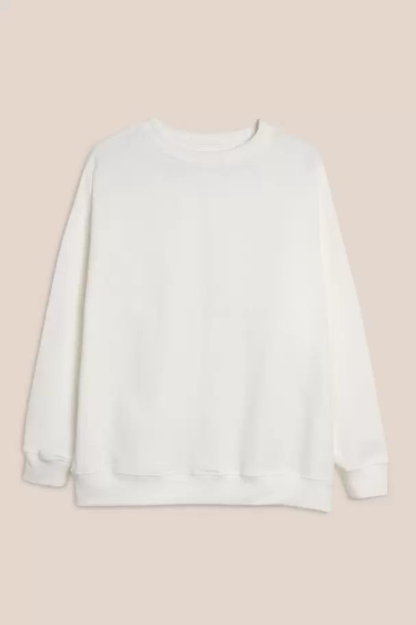 Buzo cuello redondo oversize unicolor con manga ranglan