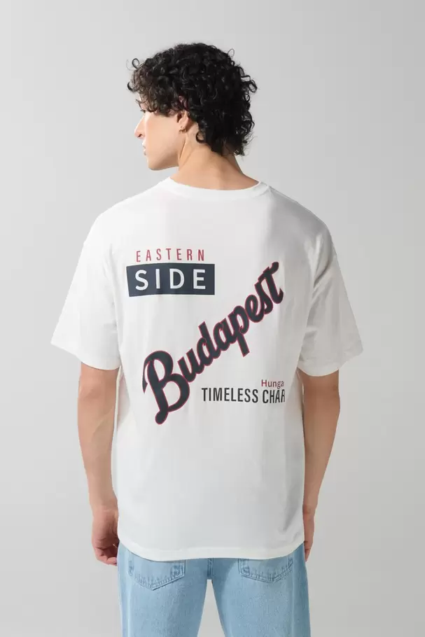 Camiseta crema manga corta oversize con diseños college