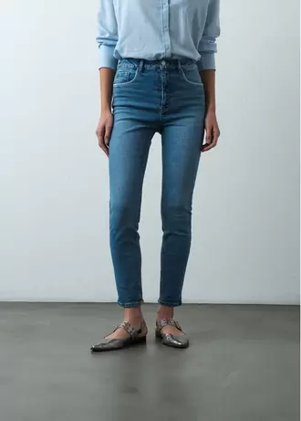 Jean Skinny tiro súper alto tono claro