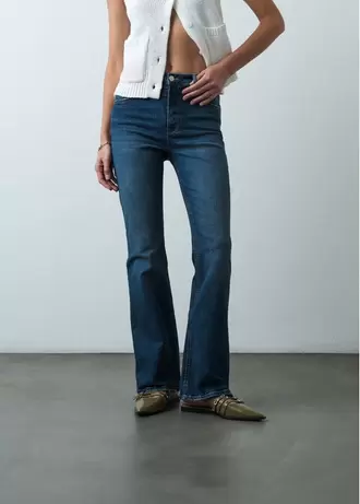 Jean Alto tiro alto de bota amplia