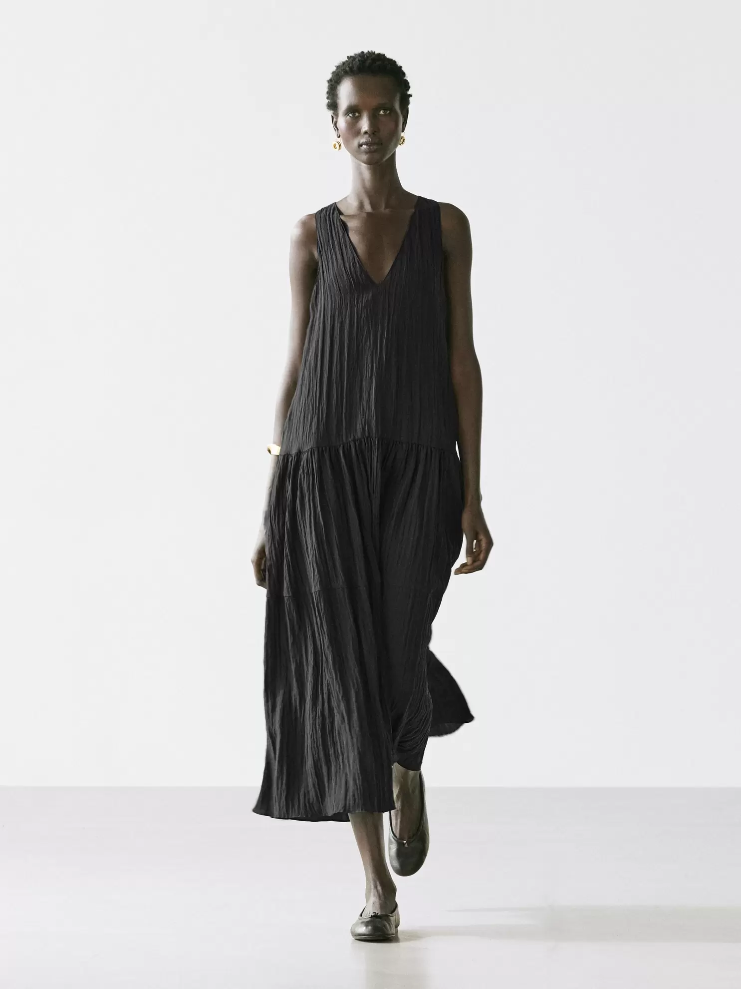 Vestido midi fluido plisado