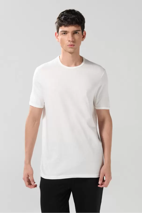 Camiseta con puños y cuello redondo en rib unicolor