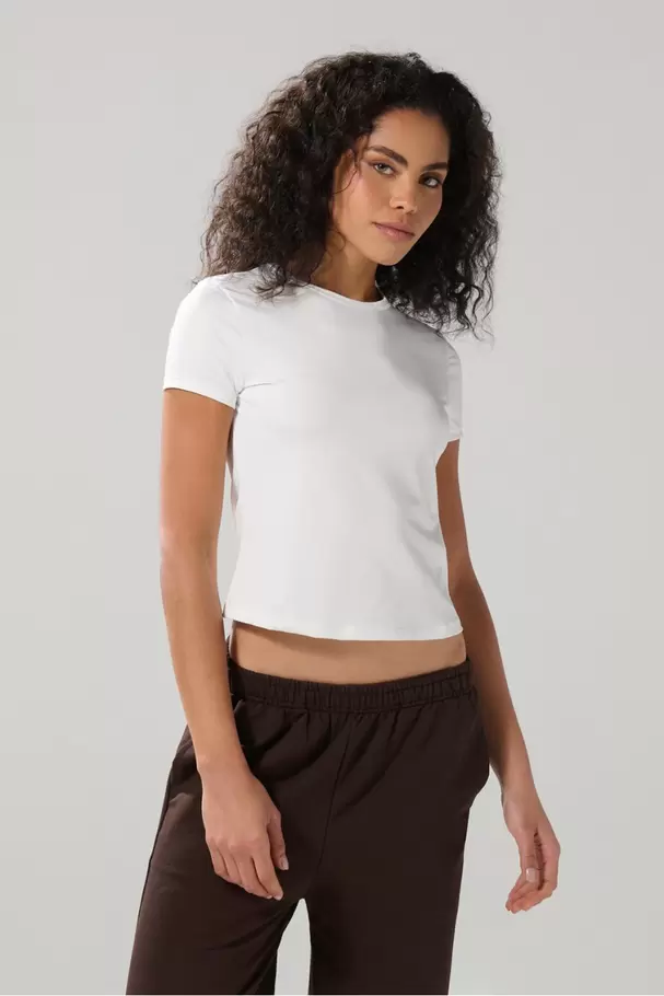 Camiseta cuello redondo unicolor con ajuste ceñido