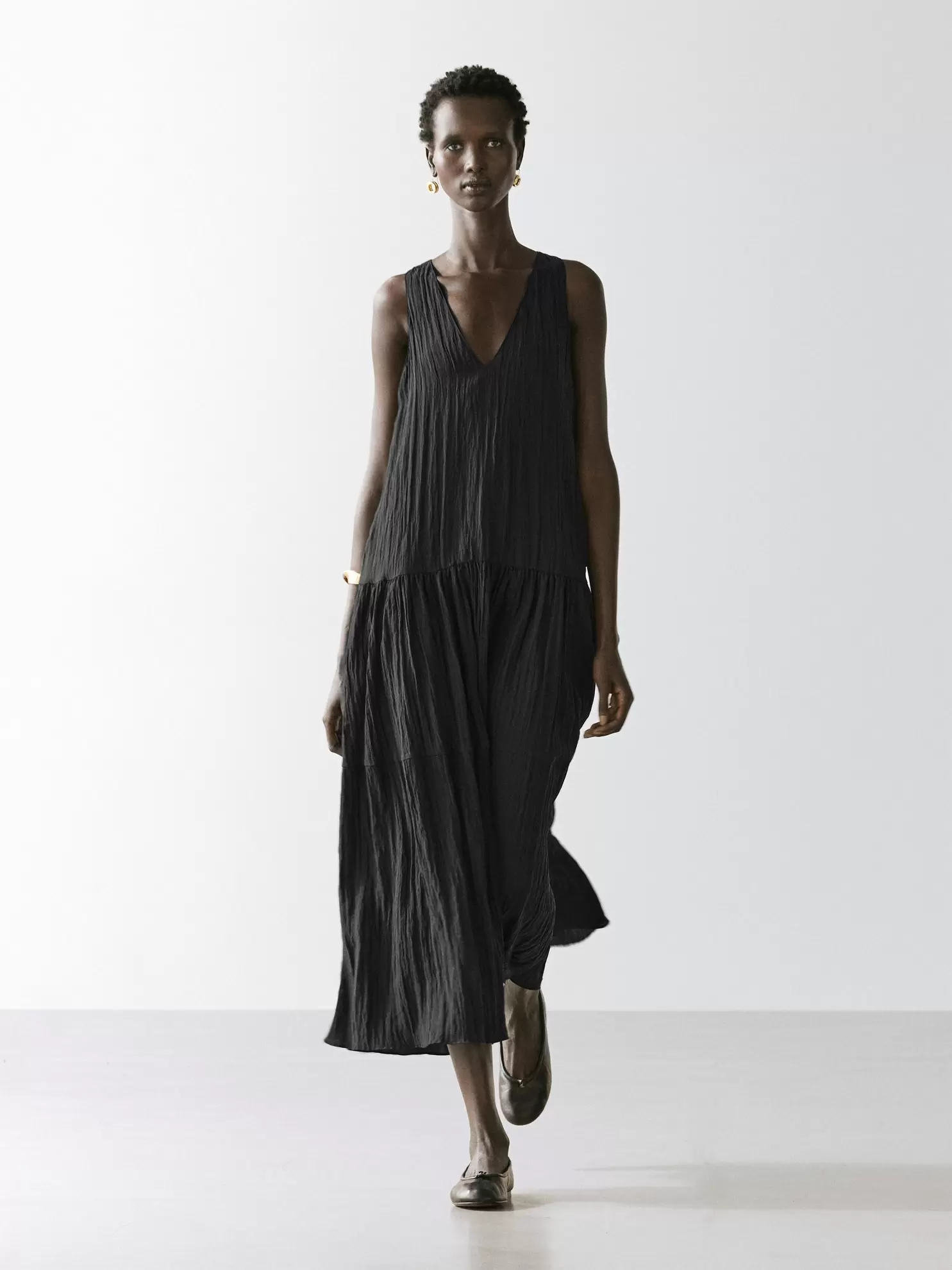 Vestido midi fluido plisado