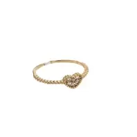 ANILLO CORAZON CENTRO CON ZIRCONES BLANCOS 18K