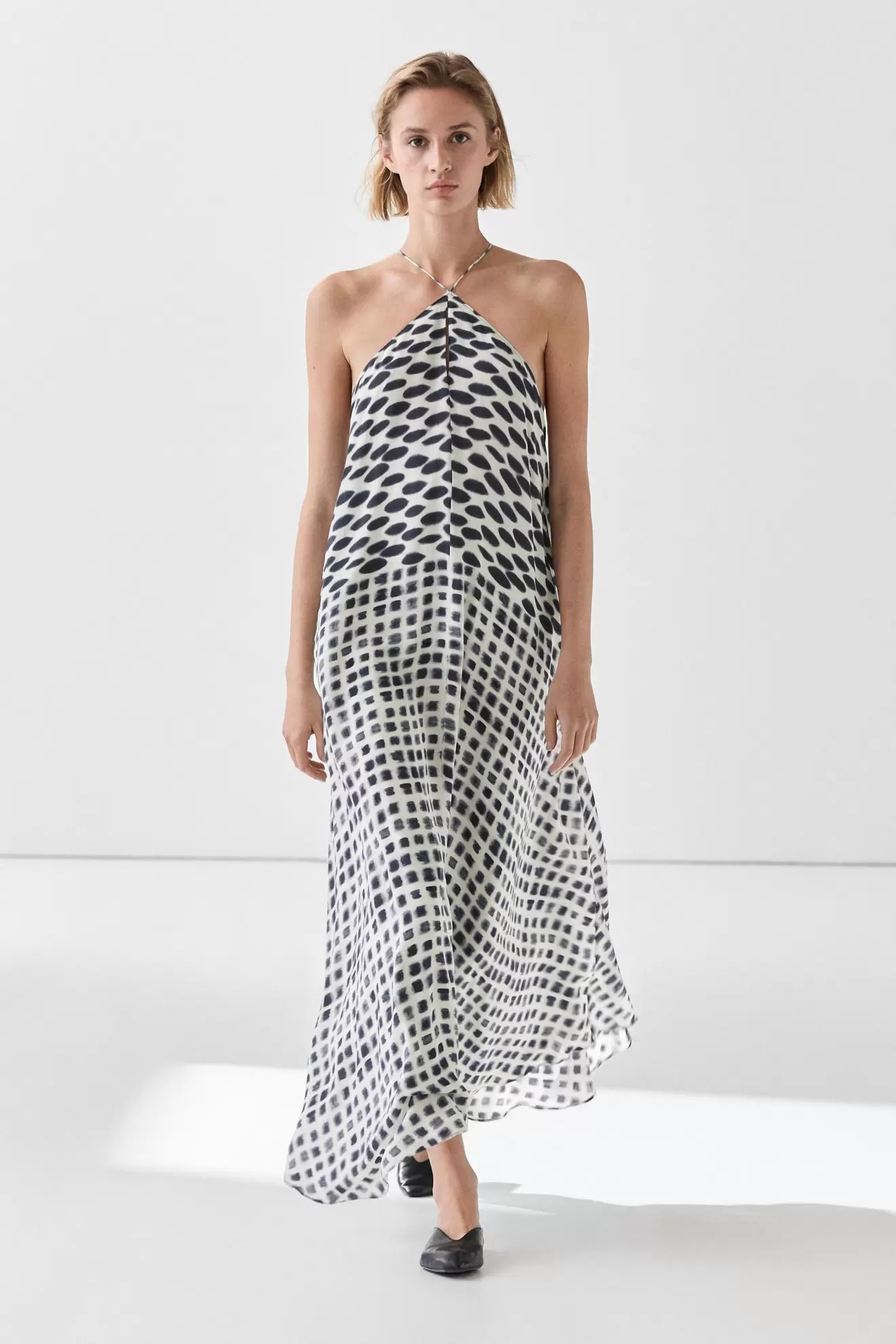 Vestido midi vuelo detalle estampado
