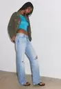 Jeans straight tiro bajo rotos