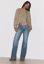 Jeans flare cinturilla cruzada