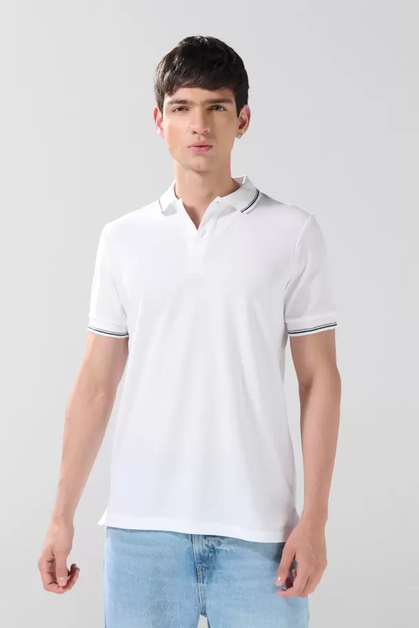 Camiseta polo manga corta unicolor con botones en frente
