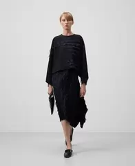 Capa corta punto con flecos mujer