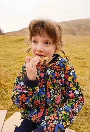 Bomber de punto para niña con estampado de flores