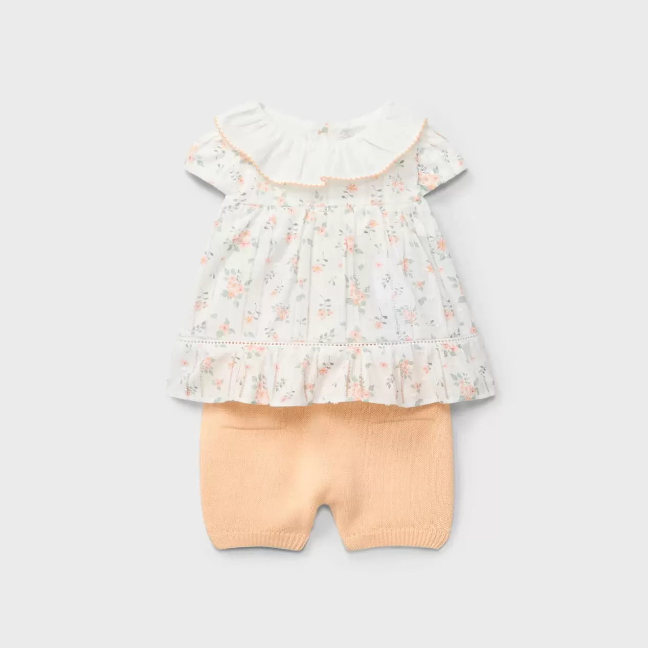 Conjunto blusa floral y pantalón tricot recién nacido