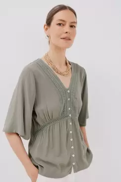 Lace blouse with ruffles