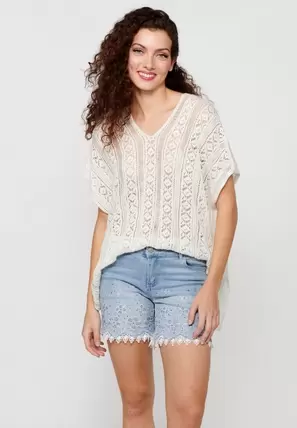 Jersey tricot holgado de punto de mangas anchas de color crudo para mujer | Moda Actual