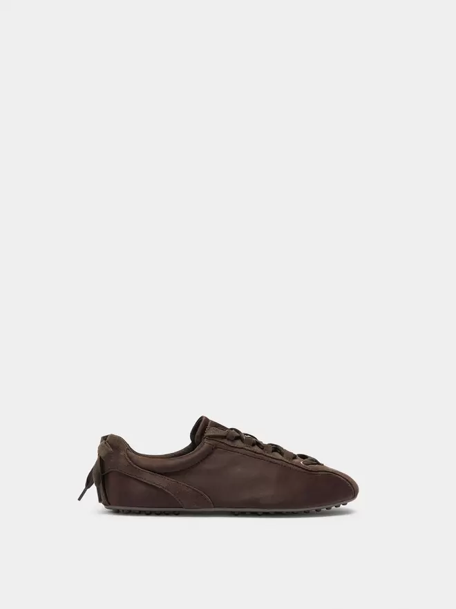 Sneakers with monochromatic leather details