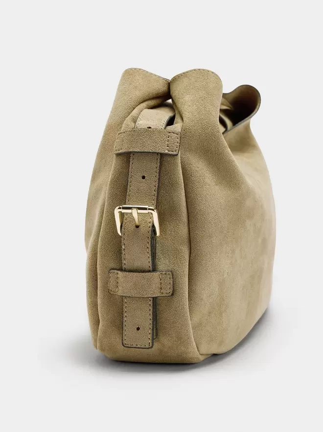 Shoulder bag with side buckles