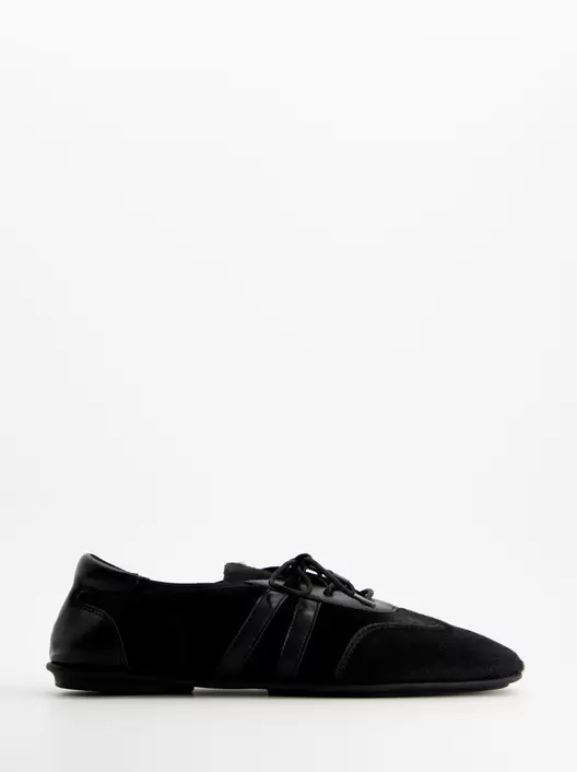 Zapatillas negras de pelo - ULK Lia