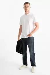 Regular jeans amb botonada