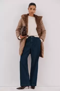 Long reversible faux fur coat