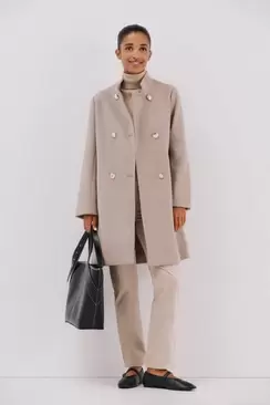 Double-breasted coat with gold buttons