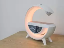 Altavoz multifuncional con cargador inalámbrico