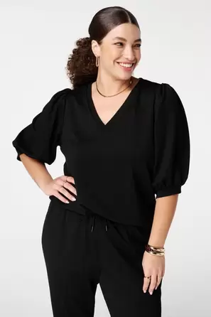 Top con mangas abullonadas